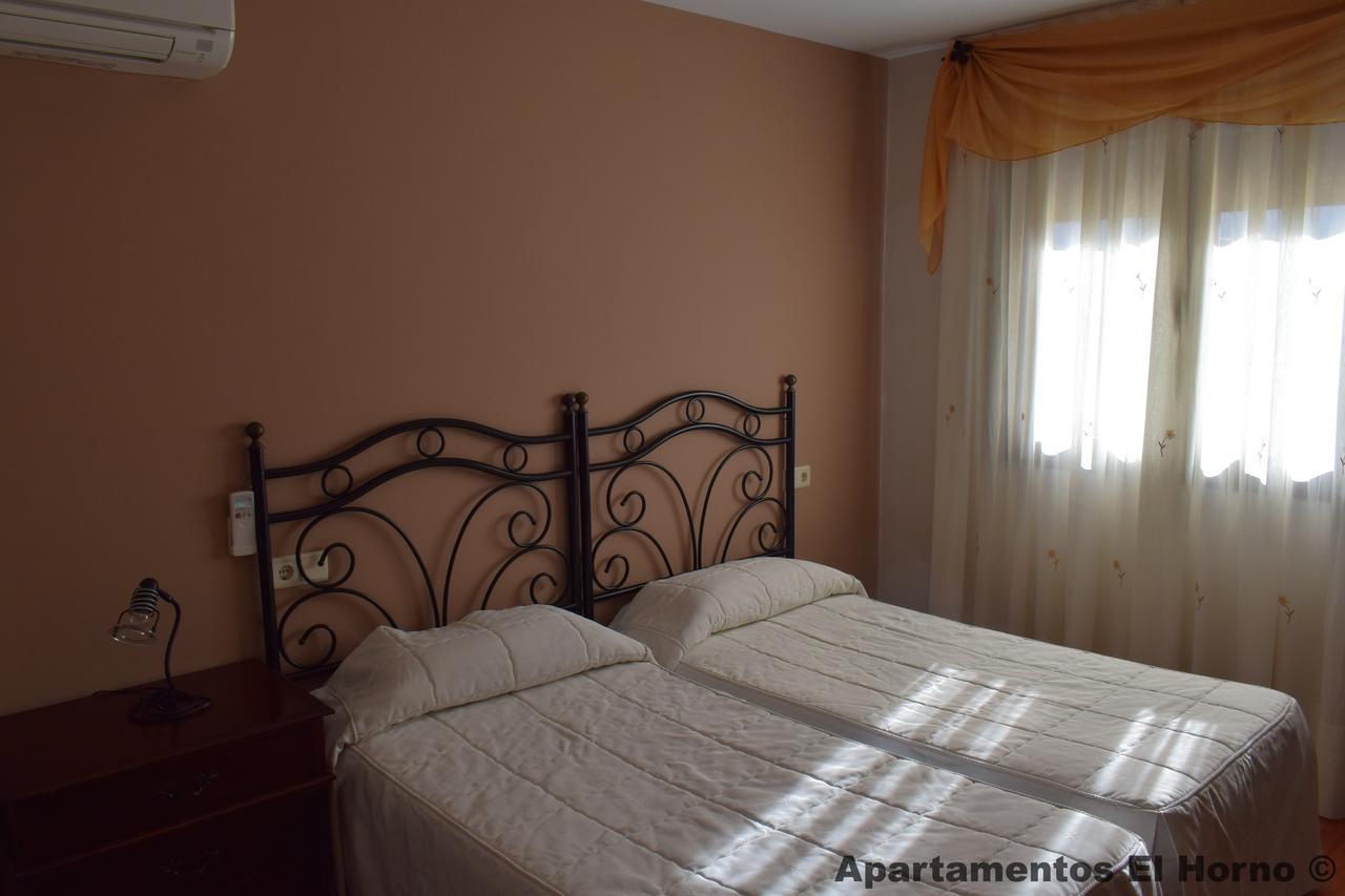 Apartamentos Horno Y Casa De Dulce Purullena Luaran gambar